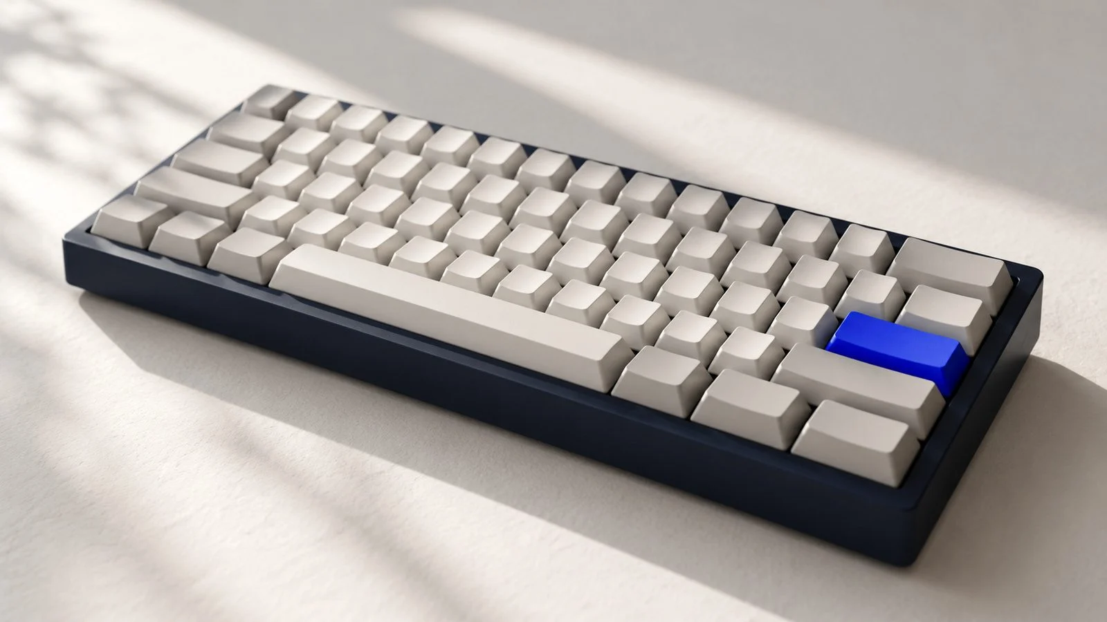 A keyboard with a single blue key.